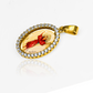 Dije Divino niño RED cristal I. Confeccionado en oro 18K por Joyería Caracas, cuenta con garantía de por vida. 
