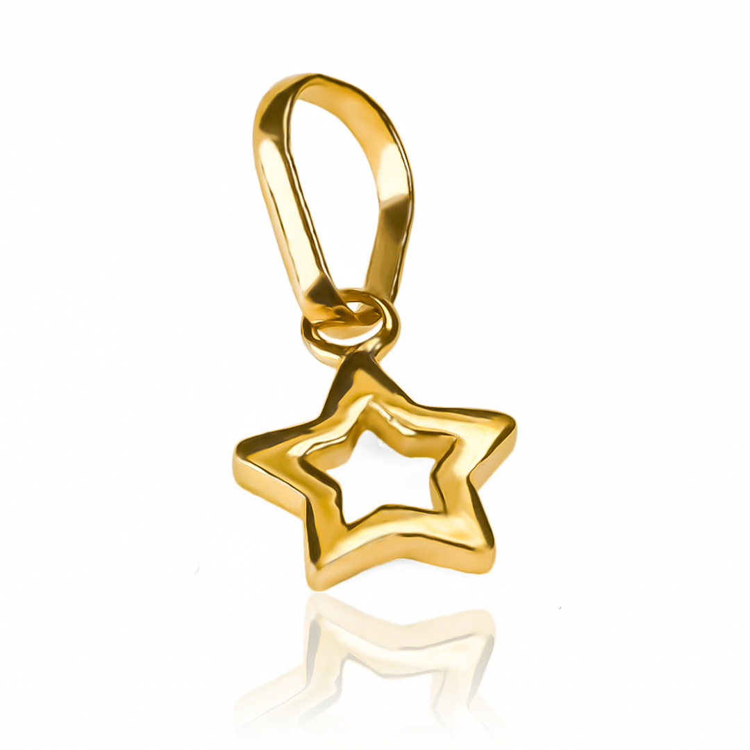 Dije Estrella calada S JT. Elaborado en Oro 18K y diseñado por Joyería Caracas, cuenta con garantía de por vida. 