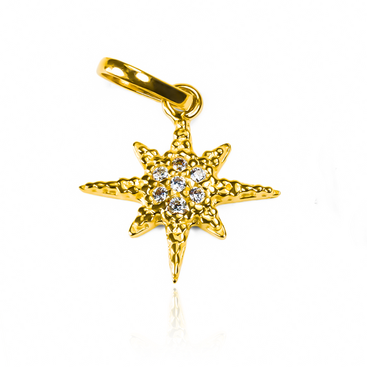 Dije Estrella centro de cristales JT. Confeccionado en oro 18K, este diseño de Joyería Caracas, cuenta con garantía de por vida. 