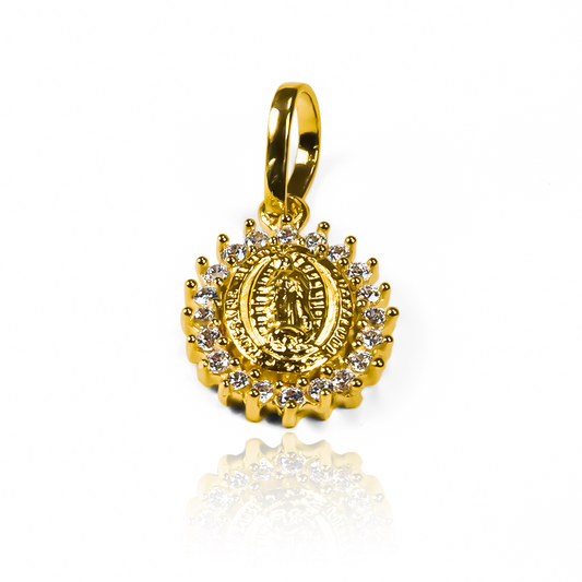 Dije Guadalupe Crystal S JT. Hecho de oro 18K y diseñado por la renombrada Joyería Caracas, cuenta con garantía de por vida. 