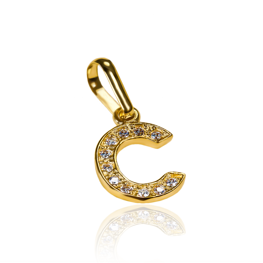 Dije Letra A crystal JT es un verdadero tesoro de Joyería Caracas. Confeccionado en oro 18K, cuenta con garantía de por vida. 