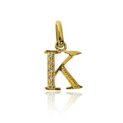 Dije Letra K cristales JC en oro 18K. Nuestra Joyería Caracas te ofrece una garantía para toda la vida.