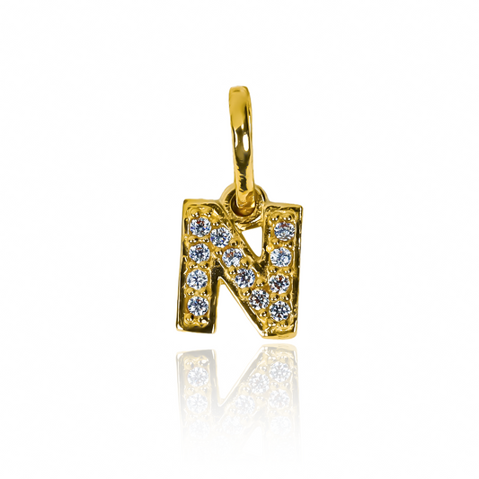 Dije Letra N crystal mini JT con un elegante diseño de oro 18K es una joya exclusiva de Joyería Caracas. Con garantía de por vida.
