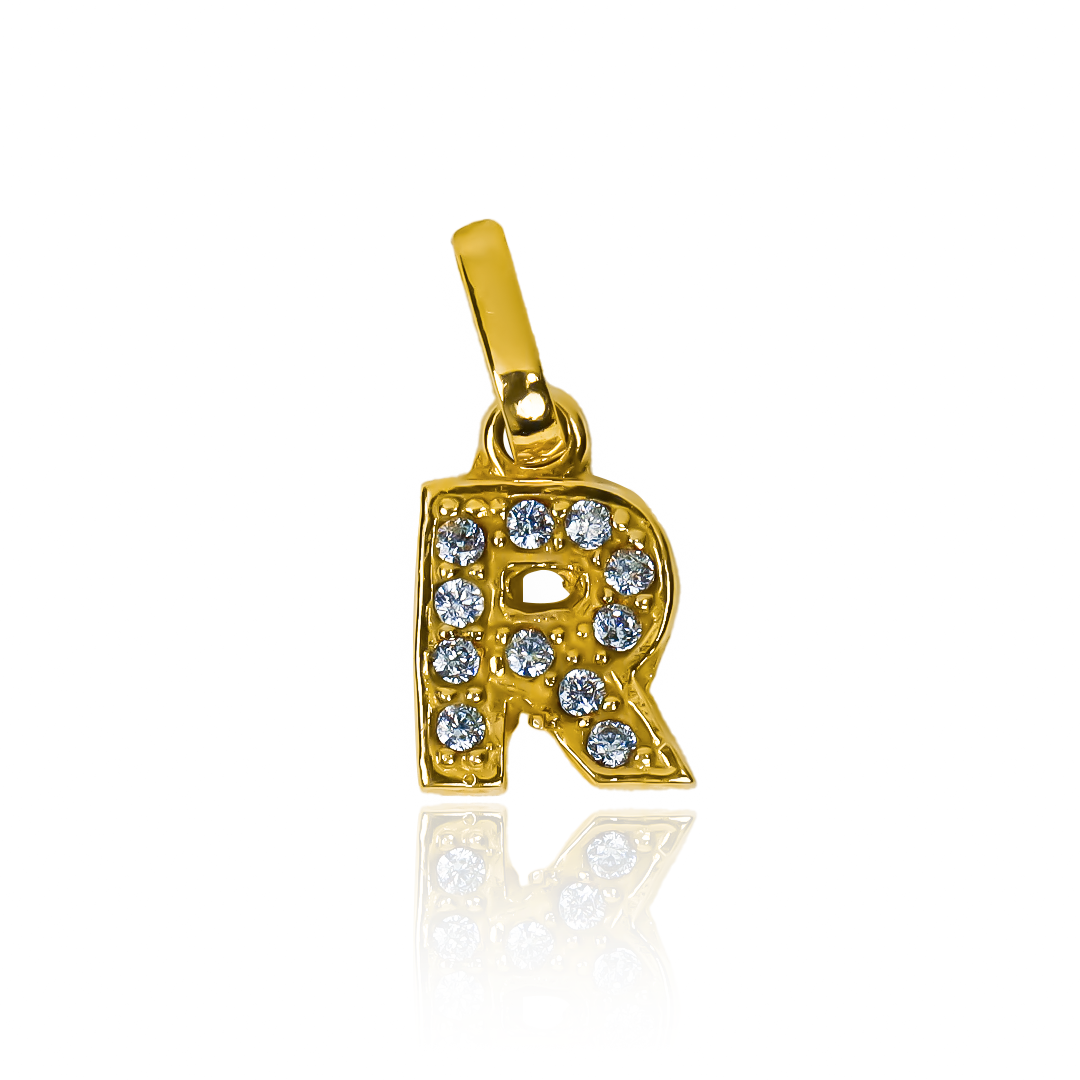 Dije Letra R crystal mini JT. Confeccionado en oro 18K y avalado por la prestigiosa Joyería Caracas, cuenta con garantía de por vida. 
