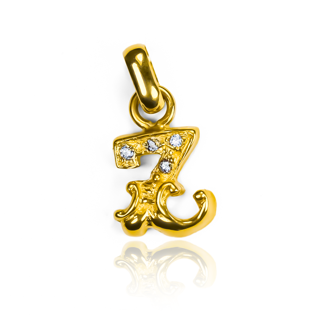 Dije Letras españolas. Hecho de oro 18K y diseñado por Joyería Caracas, cuenta con garantía de por vida. 