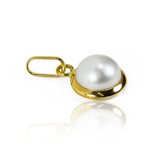 Dije Media perla #6_5 JT de Joyería Caracas en oro 18k, cuenta con garantía de por vida. 