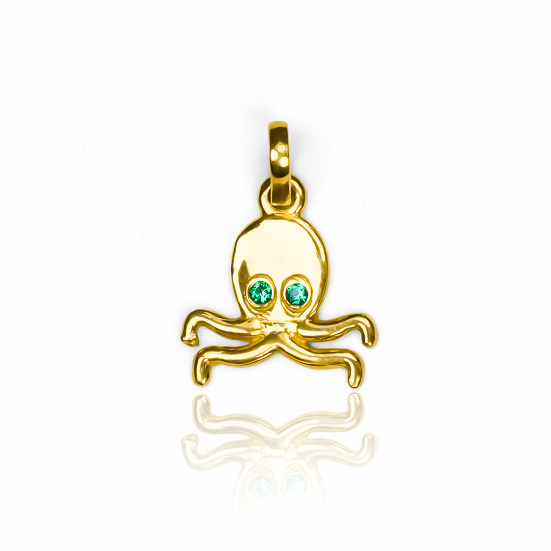 Dije Pulpo JT, hecho con oro de 18K de la prestigiosa Joyería Caracas. Con garantía para toda la vida.