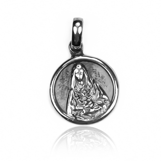 Dije Sagrado corazón JC, elaborado en Oro 18K y creado por Joyería Caracas. Con garantía para toda la vida.