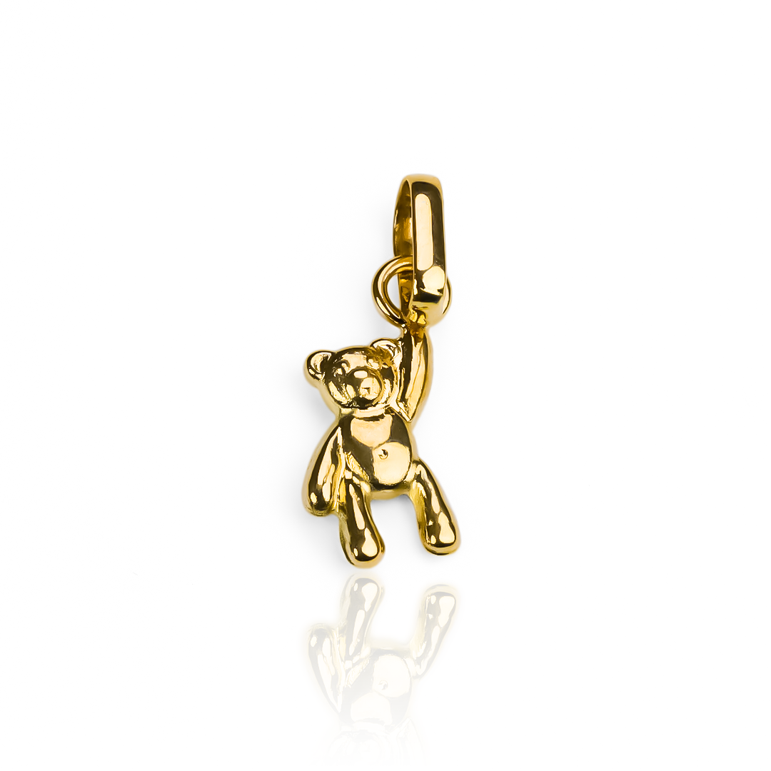 Dije Teddy S JT de oro 18K de Joyería Caracas. Con una garantía para toda la vida.
