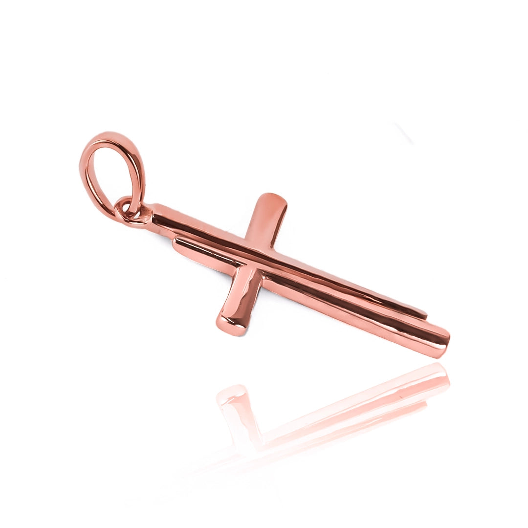 Dije Cruz Bicolor JC. Hecho con oro 18K, en Joyería Caracas es una verdadera obra de arte. Cuenta con garantía de por vida. 