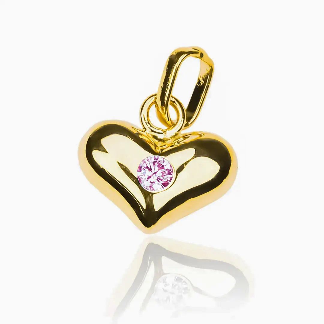 Dije Corazón soplado con centro de cristal. Hecho de oro 18K y diseñado por Joyería Caracas, cuenta con garantía de por vida. 