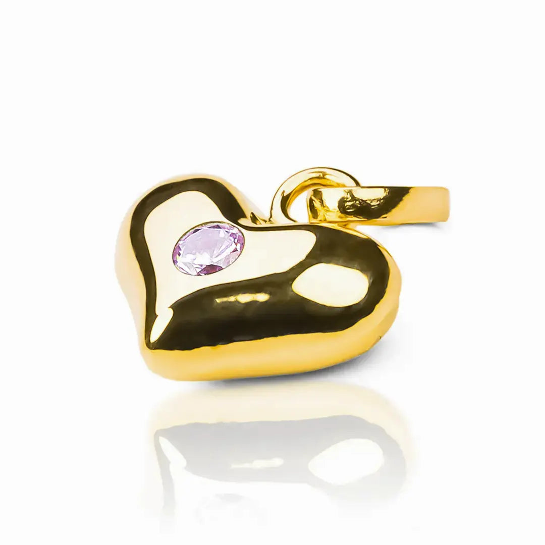 Dije Corazón soplado con centro de cristal. Hecho de oro 18K y diseñado por Joyería Caracas, cuenta con garantía de por vida. 