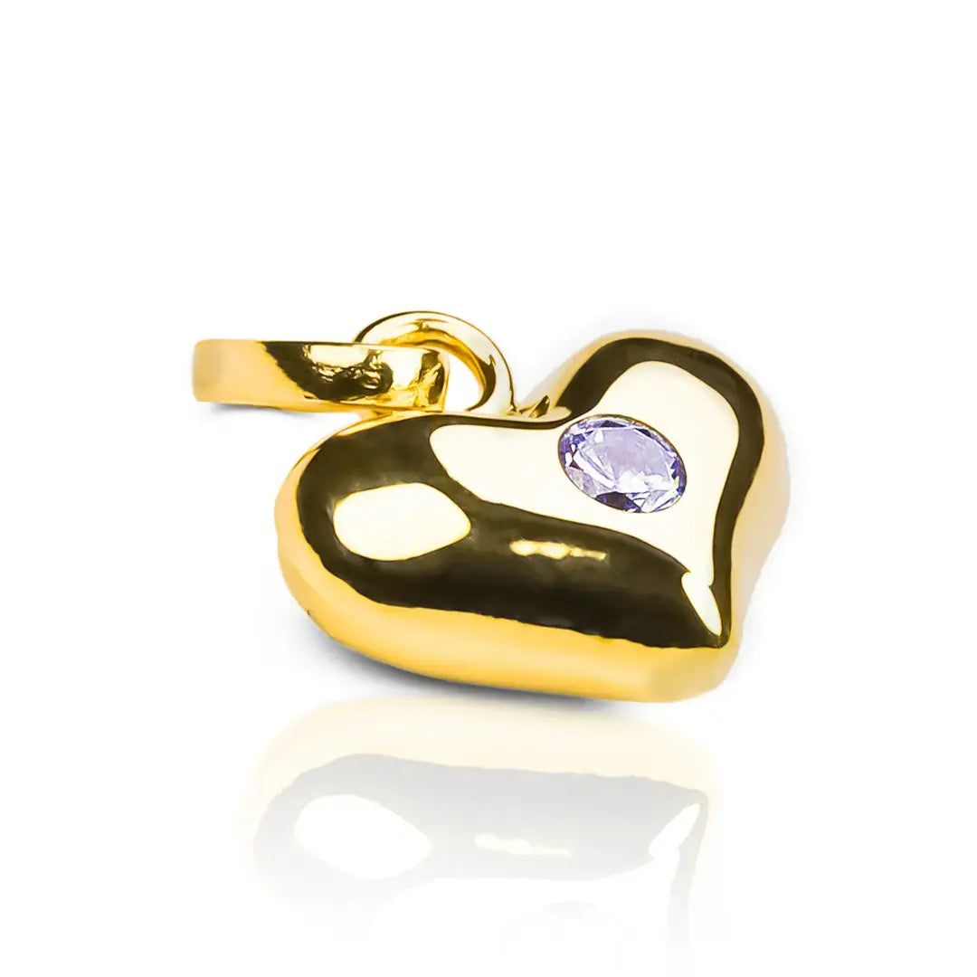 Dije Corazón soplado con centro de cristal. Hecho de oro 18K y diseñado por Joyería Caracas, cuenta con garantía de por vida. 
