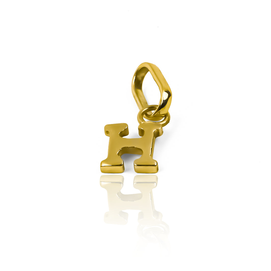 Dije Letra H mini JC, elaborada en Oro 18K por Joyería Caracas, cuentan con garantía para toda la vida.