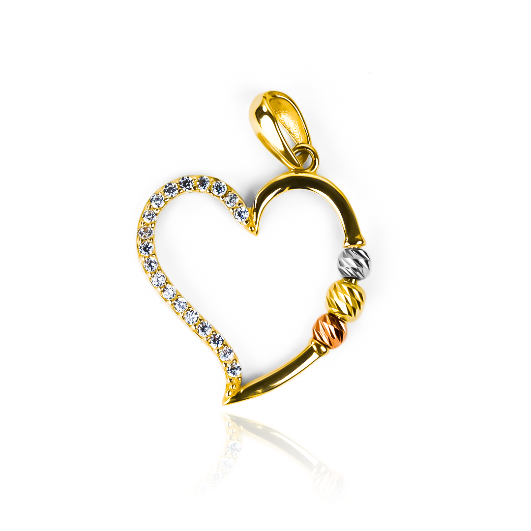 Dije Corazón 3 oros I son una obra de arte de Joyería Caracas, hechos con Oro 18K de la más alta calidad. Cuenta con garantía de por vida. 