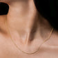Cuello de mujer con cadena en tejido singapur en oro amarillo de 18k, hecho en Joyería Caracas. 