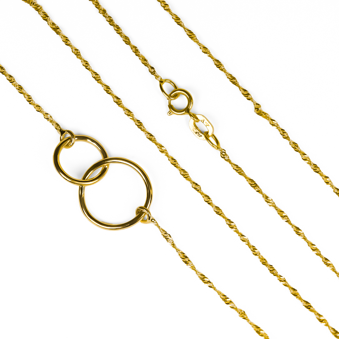 Gargantilla Aros Sin Fin, elaborado en oro 18K por Joyería Caracas, cuenta con un certificado de calidad y garantía de por vida.