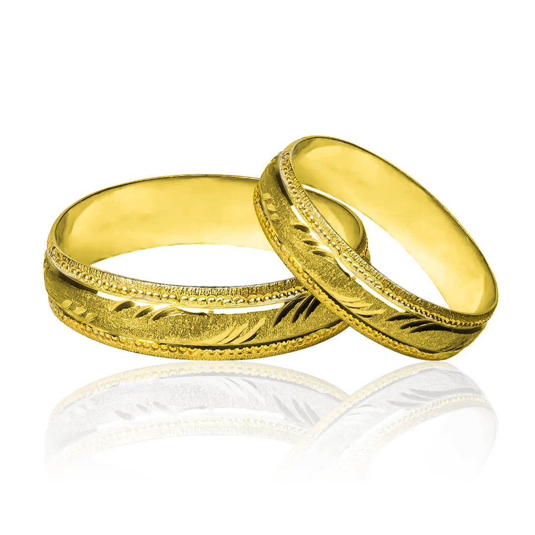 Argollas de Matrimonio Olas Facetadas, fabricadas en oro de 18k de Joyería Caracas, cuentan con certificado de calidad y garantía para toda la vida.