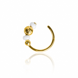 Piercing Bola Facetada, fabricado en oro 18K por Joyería Caracas, cuenta con certificado de calidad y garantía de por vida.