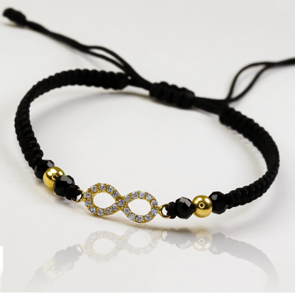 Pulsera Infinito cristales #4 elaborada en Oro 18K por Joyería Caracas. Además, cuenta con una garantía para toda la vida.