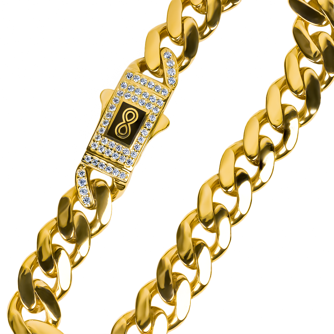 Pulsera cubana ancha con tipo de cierre broche con circones engastados.