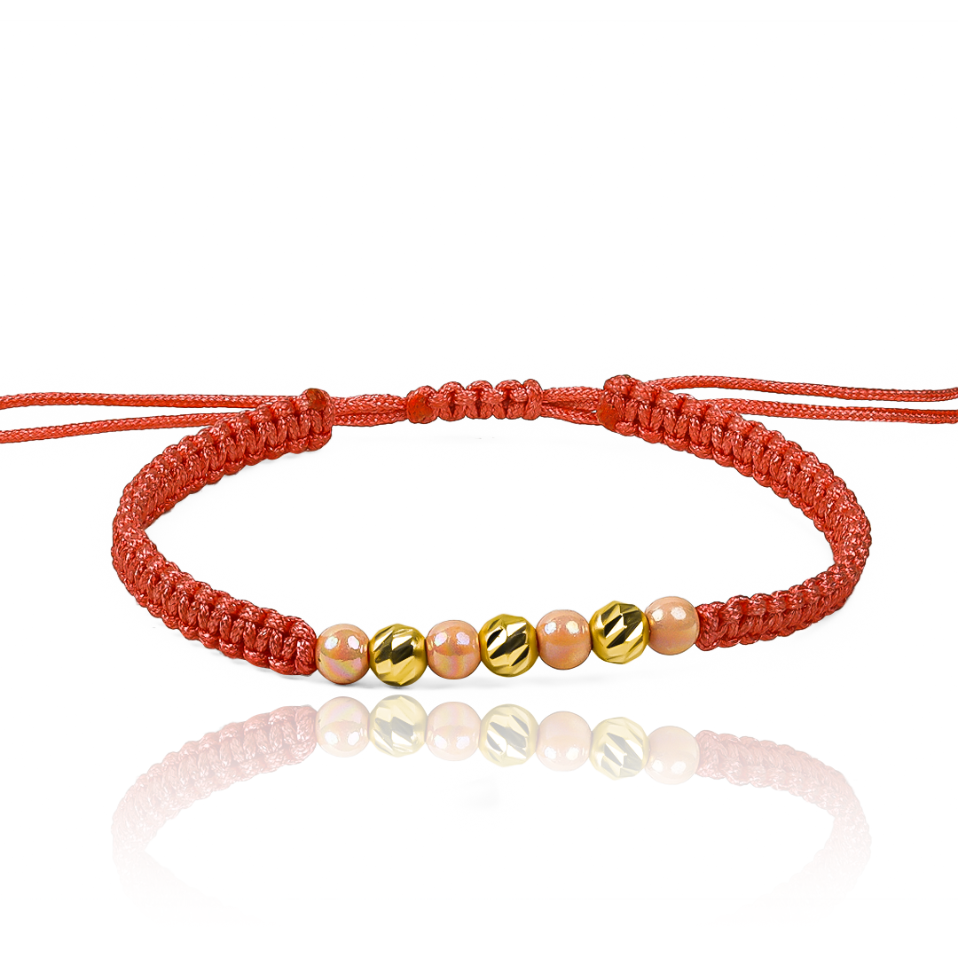 Pulsera Esferas Facetadas #4 x 3 de Joyería Caracas está elaborada en oro 18k con hilo coreano y bisutería de calidad. Viene con garantía de por vida y sin costo adicional.