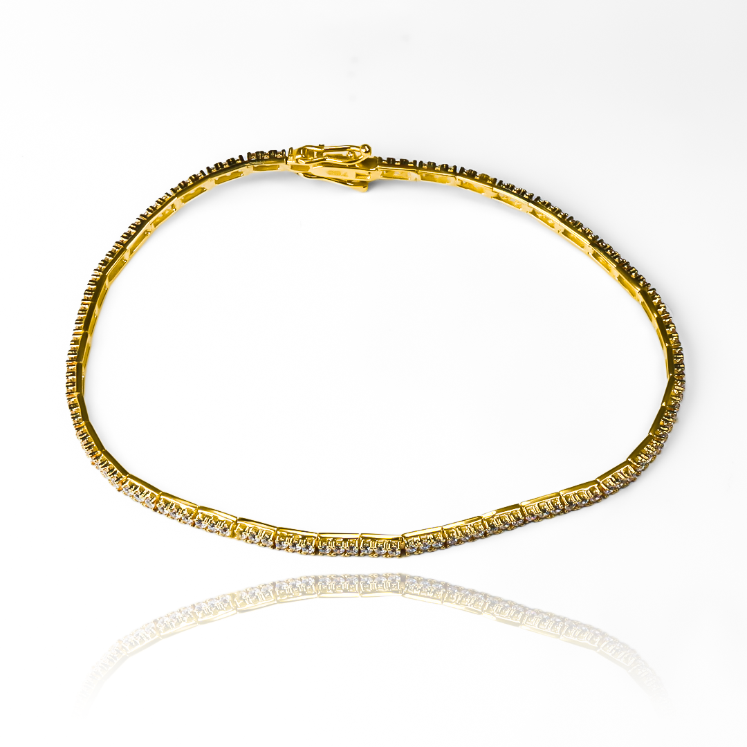 Pulsera Tennis SI, creada con Oro 18K de la prestigiosa Joyería Caracas. Además, cuenta con una garantía para toda la vida, asegurando su calidad y exclusividad.