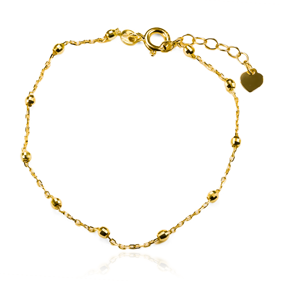 Descubre la elegancia y la exclusividad con nuestra pulsera de esferas facetadas en oro 18K. Cada pieza es una verdadera obra de arte de Joyería Caracas, con garantía para toda la vida. Añade un toque de lujo a tu estilo con esta pulsera única.