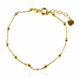 Descubre la elegancia y la exclusividad con nuestra pulsera de esferas facetadas en oro 18K. Cada pieza es una verdadera obra de arte de Joyería Caracas, con garantía para toda la vida. Añade un toque de lujo a tu estilo con esta pulsera única.