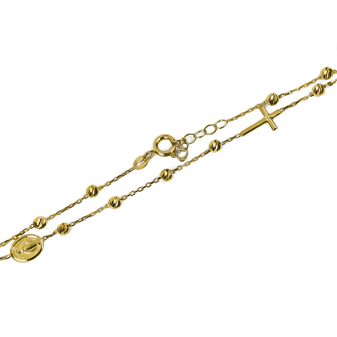 Denario facetado M I, fabricado en Oro 18K por Joyería Caracas, cuenta con garantía para toda la vida.
