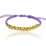 Pulsera Esferas Facetadas y Lisas de Joyería Caracas está hecha en oro 18k y cuenta con detalles en hilo coreano y bisutería de calidad. Con garantía de por vida.