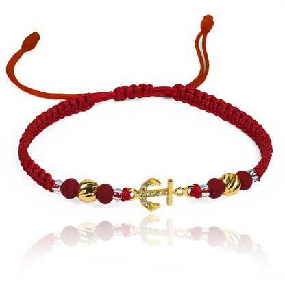 Pulsera Ancla + Esferas #5 de Joyería Caracas está elaborada en oro 18k, con detalles en hilo coreano y bisutería de calidad. Con garantía de por vida y sin costo adicional.