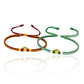 Pulsera de la Joyería Caracas presenta una hermosa estrella en oro 18K, simbolizando triunfo. Esta pulsera se puede realizar con cualquier tipo de color de hilo, con la intención de representar los equipos de fútbol. Con garantía de por vida, es una joya única y duradera.