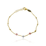 Pulsera faceted spheres 3 oros de Joyería Caracas. Confeccionada en oro 18K, esta pieza cuenta con un certificado de calidad y garantía de por vida.