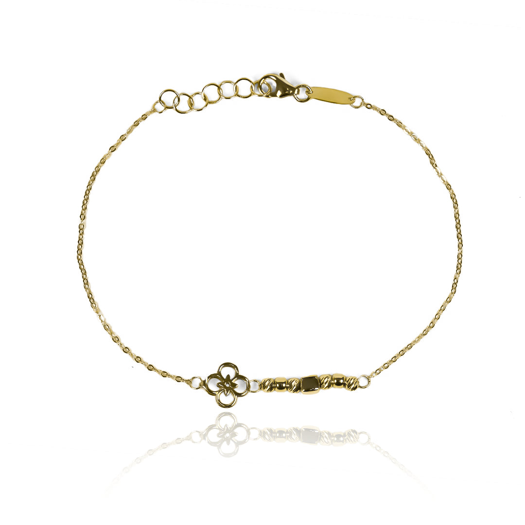 Pulsera Flor brillo fabricada en Oro 18K por Joyería Caracas, cuenta con una garantía para toda la vida.