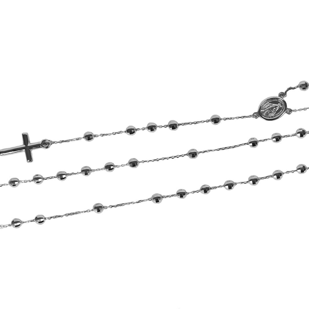 Rosario White ML Facetado I, fabricado en oro 18K por Joyería Caracas, cuenta con un certificado de calidad y garantía de por vida.