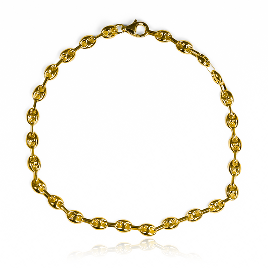 Disfruta de la elegancia y sofisticación con nuestra tobillera Calabrote M JT. Hecha de oro 18K, esta pieza exclusiva de Joyería Caracas te asegura una garantía de por vida. Un complemento que destaca tu estilo y te acompaña en cada momento.