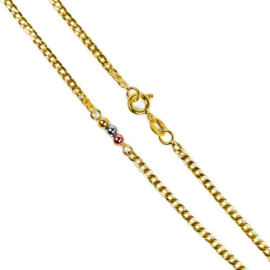 Tobillera cubana + esferas 3 oros #3 de Joyería Caracas. Hecha de oro 18K y con garantía de por vida, esta tobillera es una inversión en elegancia y calidad. Dale un toque de lujo a tu estilo con esta pieza exclusiva.