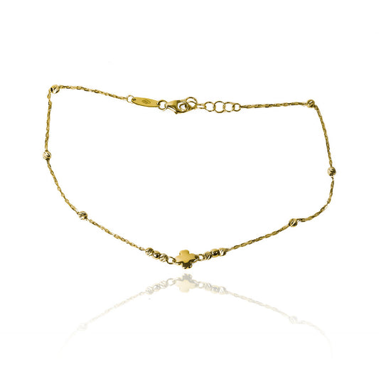 Tobillera treboles y esferas de Oro 18K de Joyería Caracas. Un accesorio exclusivo con diseño de tréboles y esferas que te acompañará de por vida. La elegancia y calidad de Oro 18K combinados con la garantía de por vida hacen de esta tobillera una verdadera joya.