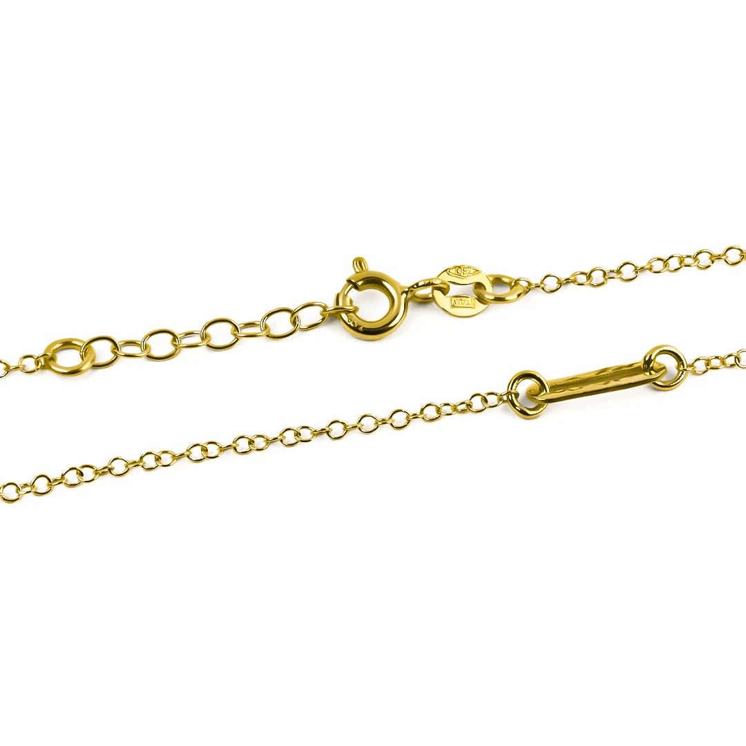 Tobillera clics elaborada en oro 18K por Joyería Caracas. Además, ofrece garantía para toda la vida.