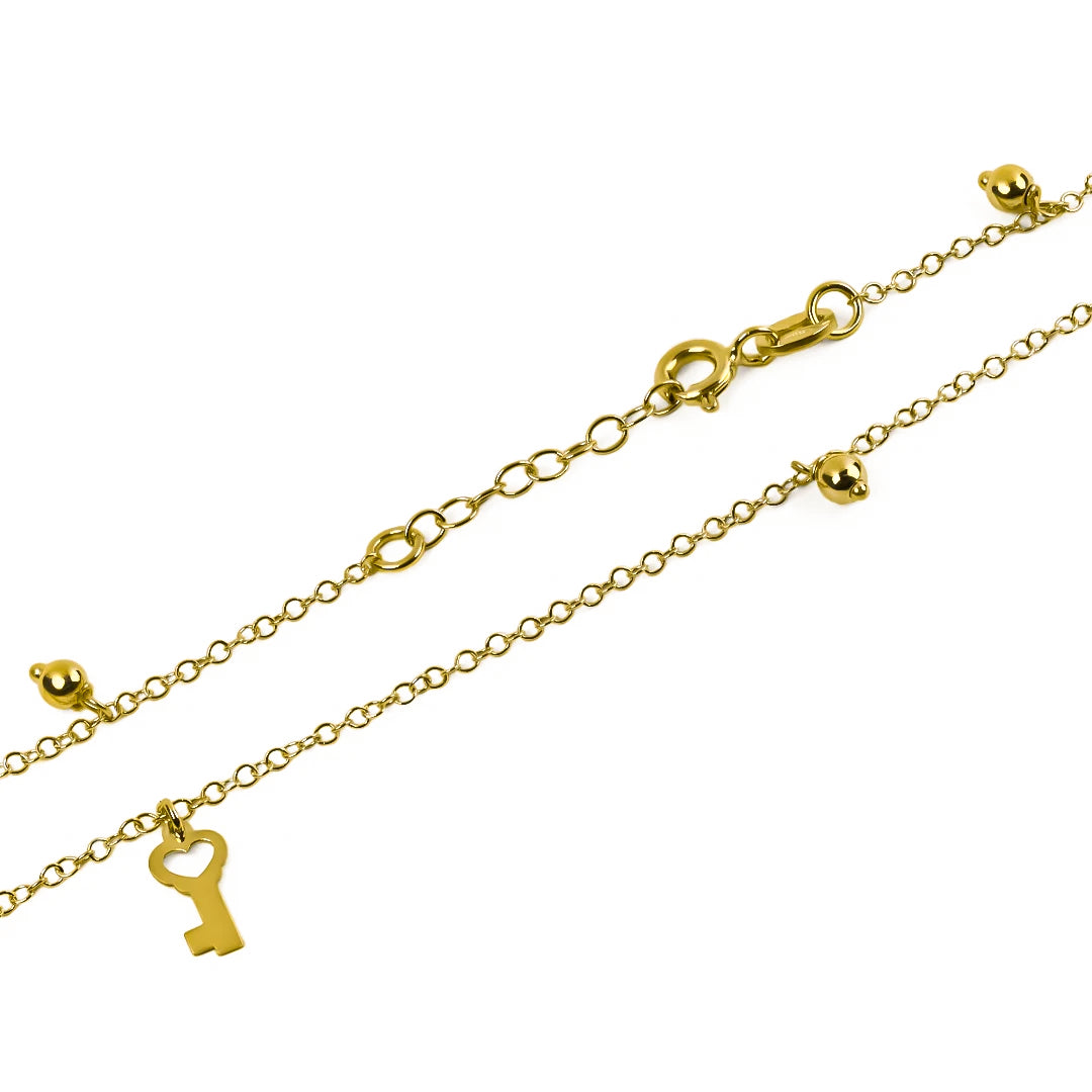Tobillera llave de tu corazón, elaborada en oro 18K por Joyería Caracas, cuenta con certificado de calidad y garantía de por vida.