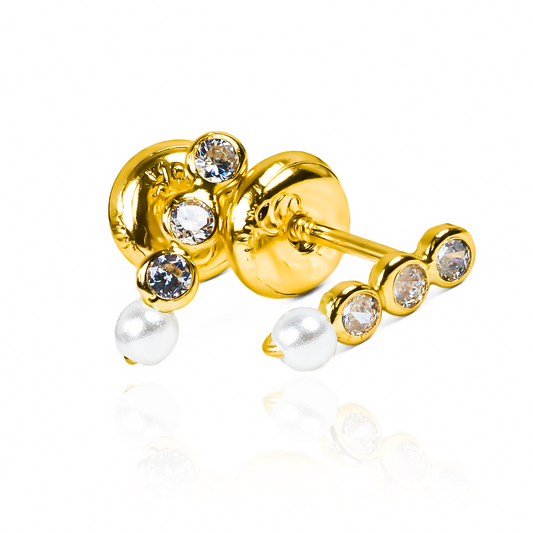 Topitos Cristales + perla en oro 18K de Joyería Caracas. Con garantía para toda la vida, esta pieza es un lujo eterno que no puede faltar en tu colección. Luce exclusiva con esta joya única, que te hará destacar en cualquier ocasión.