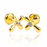 Topitos Cruz centro cristal es una pieza de joyería de lujo elaborada en oro 18K. Proviene de la exclusiva Joyería Caracas y cuenta con una garantía de por vida, asegurando su calidad y durabilidad.