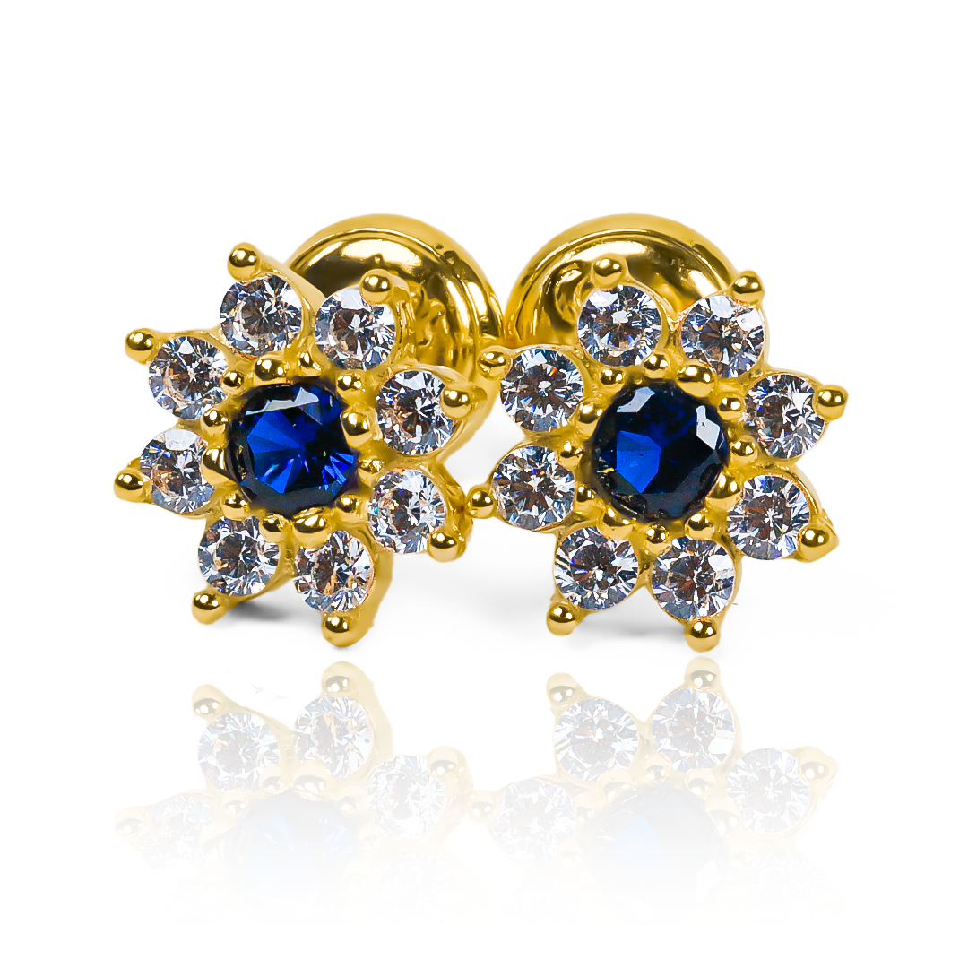Lleva tu estilo al siguiente nivel con los Topitos Flor cristal Blue JT. Hechos con Oro 18K y garantía para toda la vida, estos joyas exclusivas de Joyería Caracas son una verdadera obra de arte. Haz una declaración de elegancia y sofisticación con estos topitos que durarán para siempre.