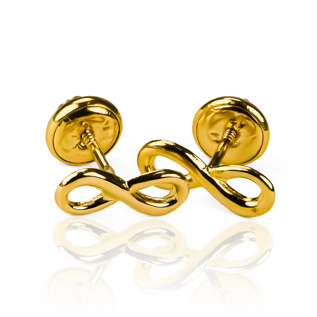 Descubre la elegancia y el lujo con nuestro Topitos Infinito liso JT de Joyería Caracas. Diseñado con oro 18K y con garantía para toda la vida, es el accesorio perfecto para agregar un toque de sofisticación a cualquier atuendo. Haz una declaración de estilo duradera con nuestro Topitos Infinito liso JT.