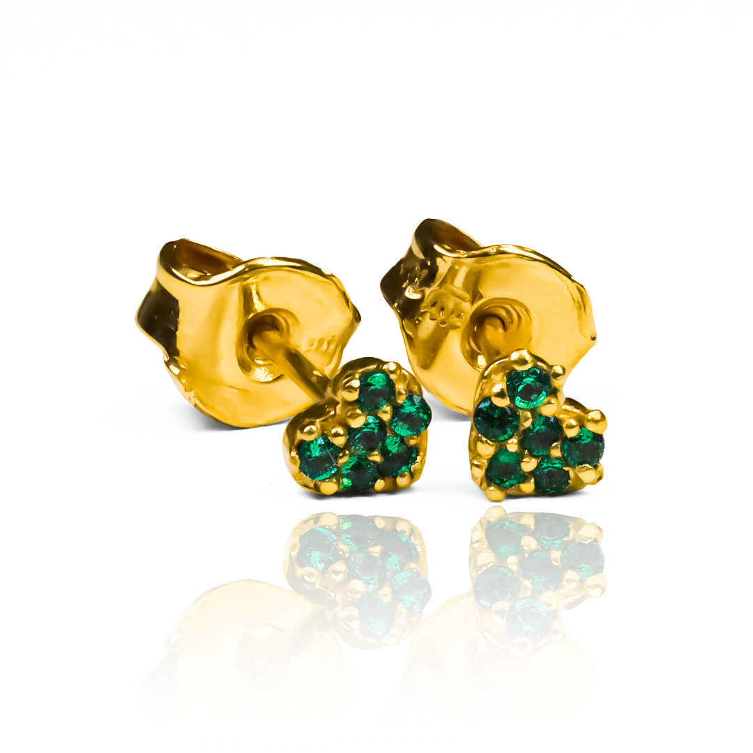Descubre la elegancia y exclusividad de los Topitos Mini Cristal Heart. Hechos con oro de 18 quilates y diseñados por Joyería Caracas, lucirán en tu colección con un brillo único. Además, ¡disfruta de nuestra garantía de por vida para este accesorio de lujo!