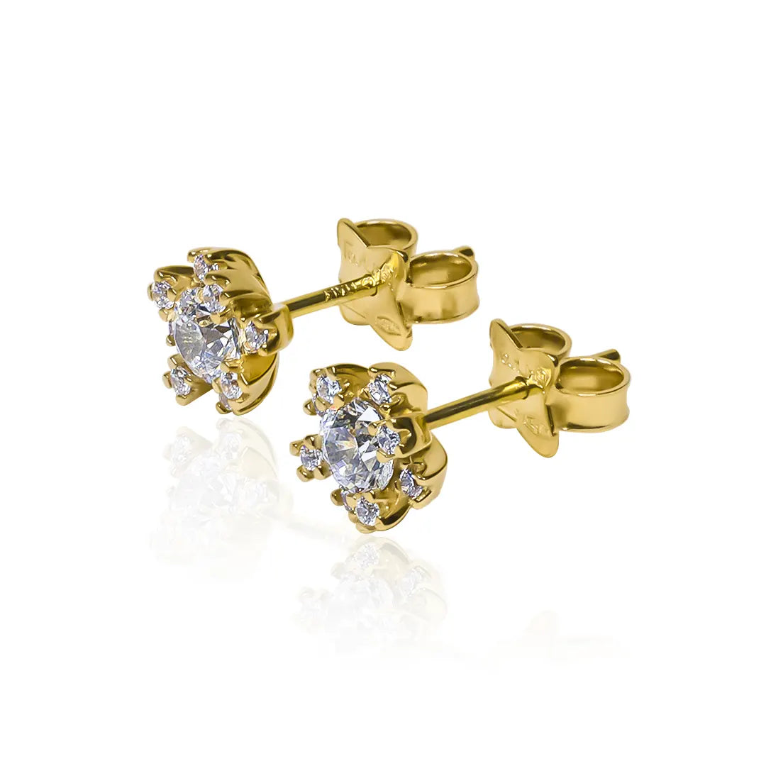 Topitos Flor Cristales I en oro 18K por Joyería Caracas y con garantía para toda la vida. Añade un toque de clase y sofisticación a tu estilo.