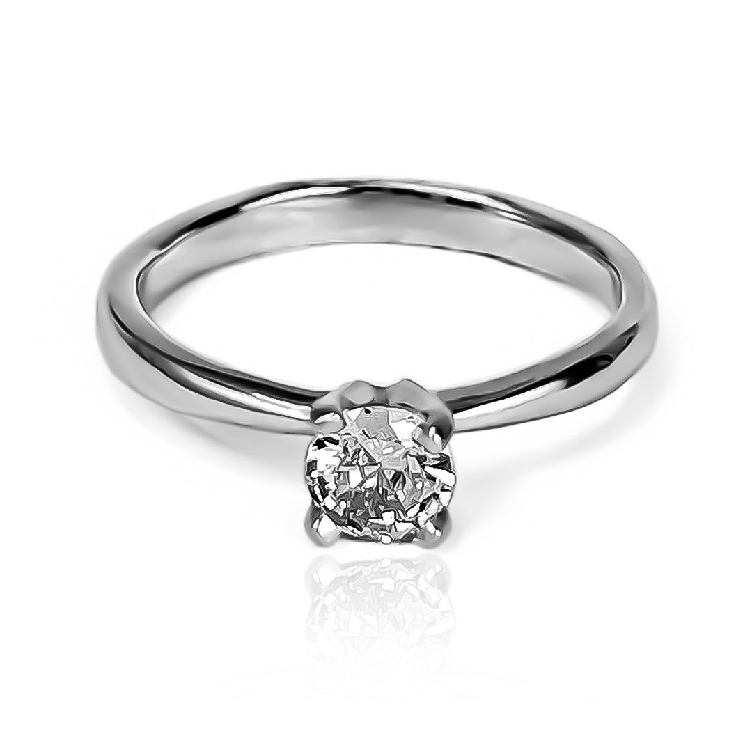 Anillo de compromiso Zigurat, una joya exclusiva fabricada por Joyería Caracas en oro de 18 quilates. La pureza del oro de 18K garantiza durabilidad y un brillo excepcional.