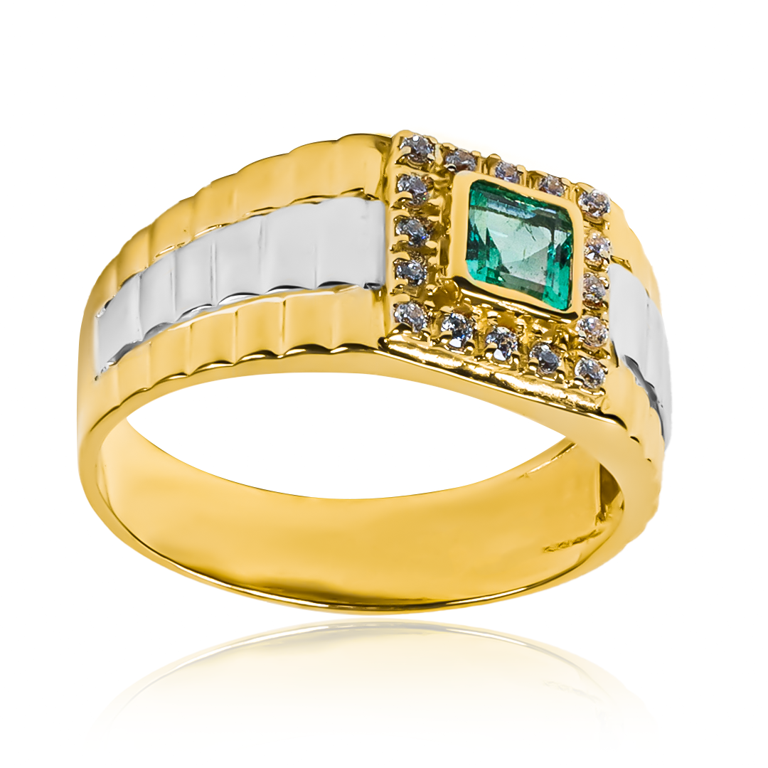 Anillo armis bicolor de oro 18k bicolor, adornado con una esmeralda de Joyería Caracas. Inspirado en la belleza de las piedras preciosas, garantizado de por vida.