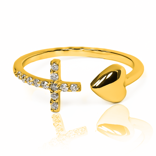 Anillo "cross and heart" de Joyería Caracas es una verdadera joya de lujo. Hecho de oro 18k, su diseño atemporal combina elegancia y modernidad. Con garantía de por vida.